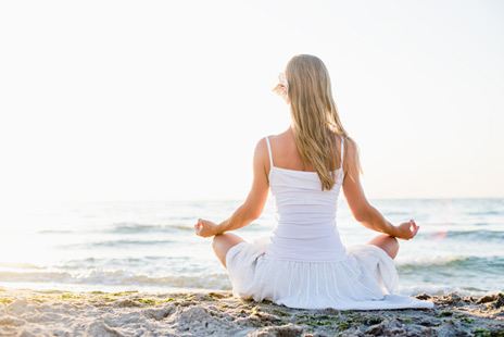 meditating on the beach